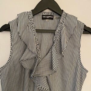 Karl Lagerfield, Paris women’s size, large sleeveless, button-down ruffle blouse